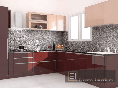 A maroon-coloured L-shaped kitchen interiors that gives a sleek look to the kitchen.