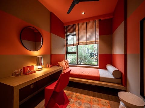 Citrus-inspired children's bedroom interior designs stimulate creativity and create a cheerful atmosphere. The predominant color in this lively space is a spectrum of oranges, ranging from soft tangerine to bold citrus hues.