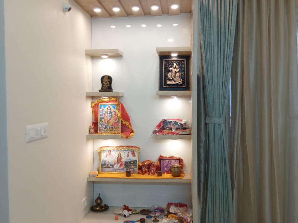 Lighting plays a crucial role in setting the right mood. The designers skillfully integrate ambient and task lighting to highlight the sacred elements of the pooja room.
